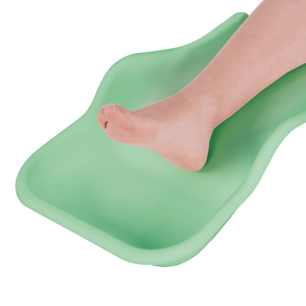 Flexible tray for the collection of pedicure residues on the foot mint green