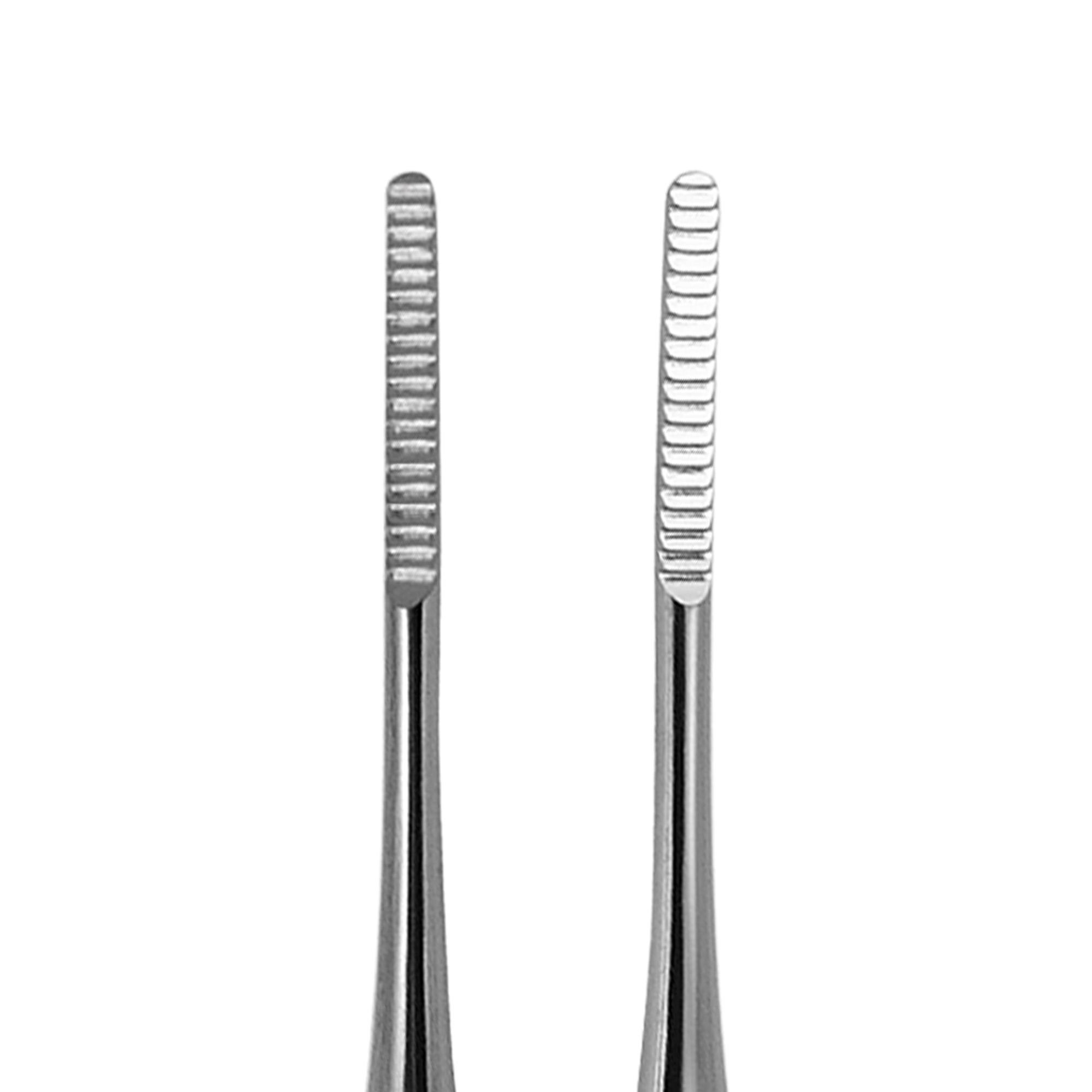 Raspador profesional de acero inoxidable con doble punta y microlima.
