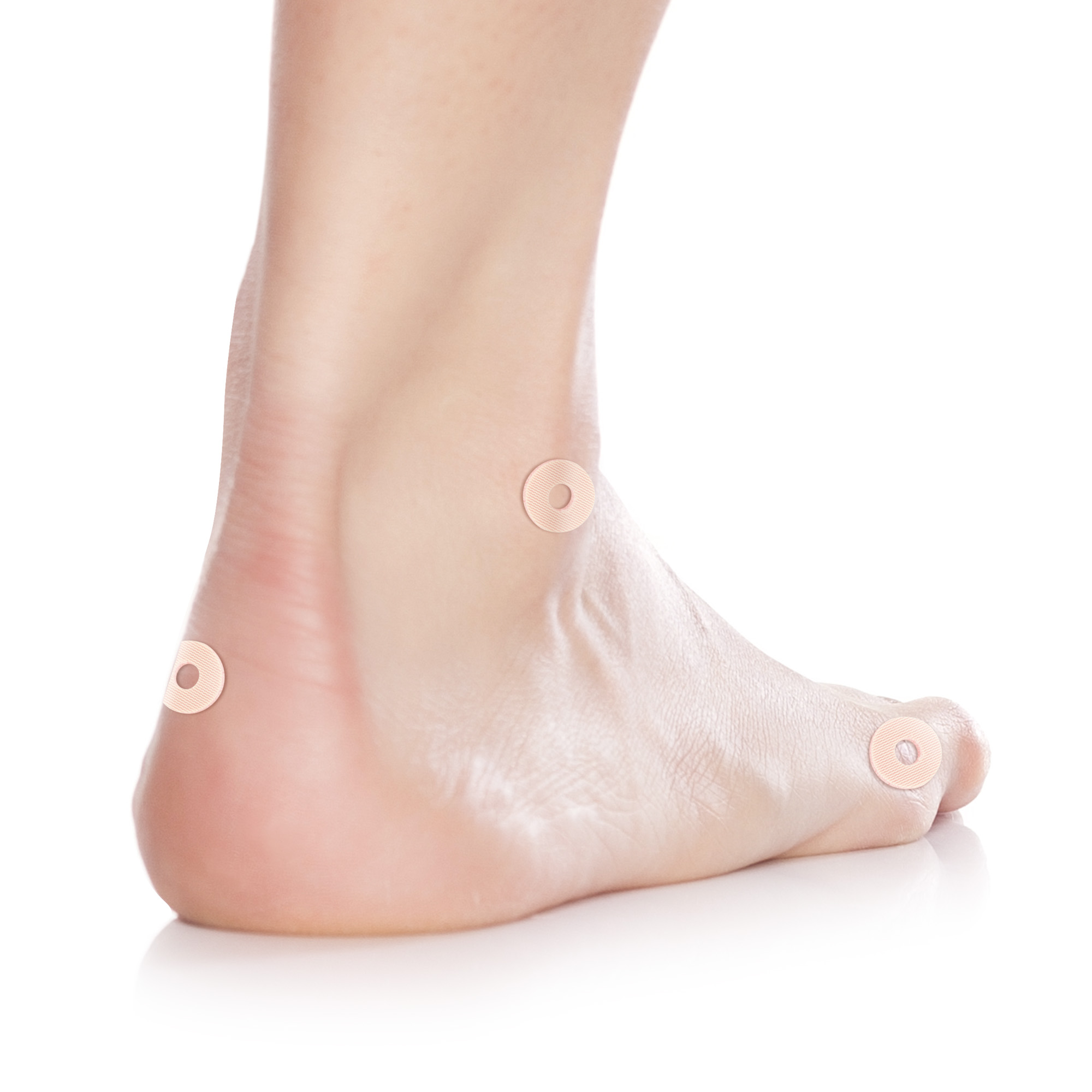 Small round latex foot protectors with central hole